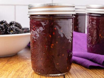 Blackberry jam in a Mason jar.