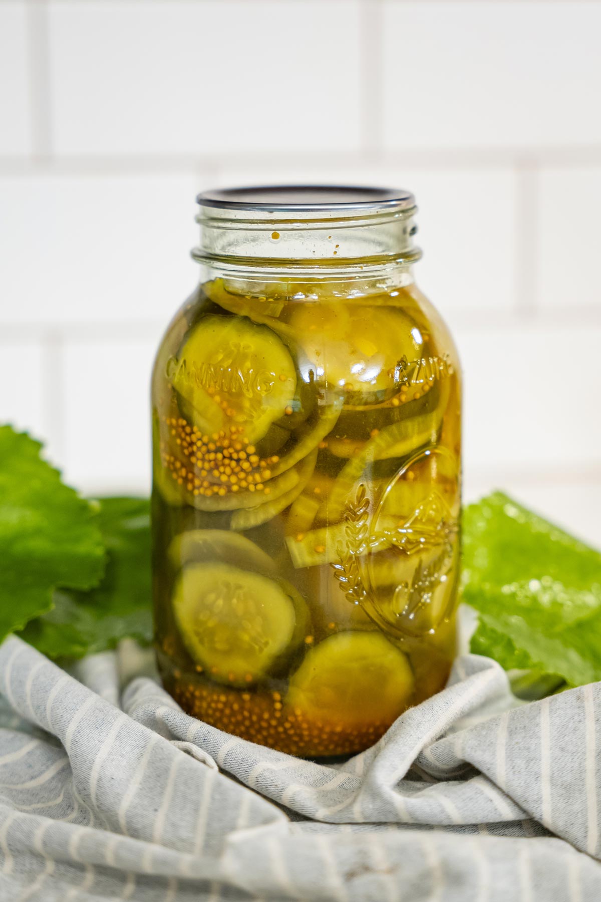 A jar of home-canned bread and butter pickles.