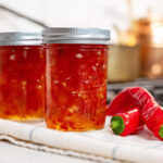 Red pepper jelly in jars.
