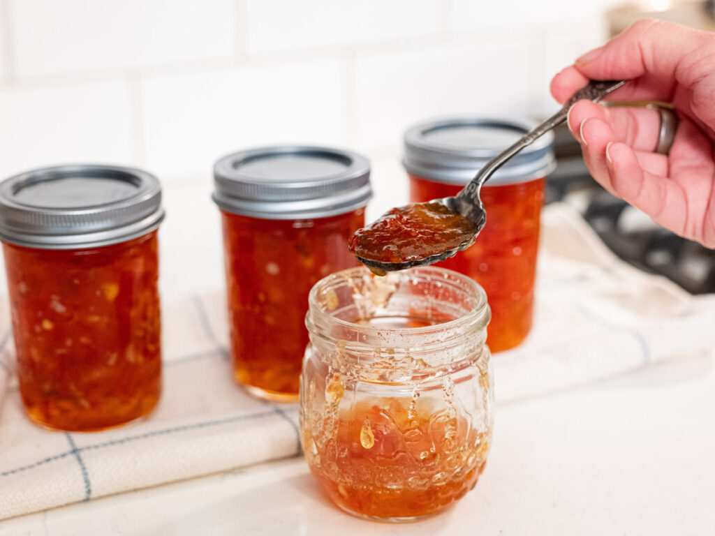 A spoonful of red pepper jelly.