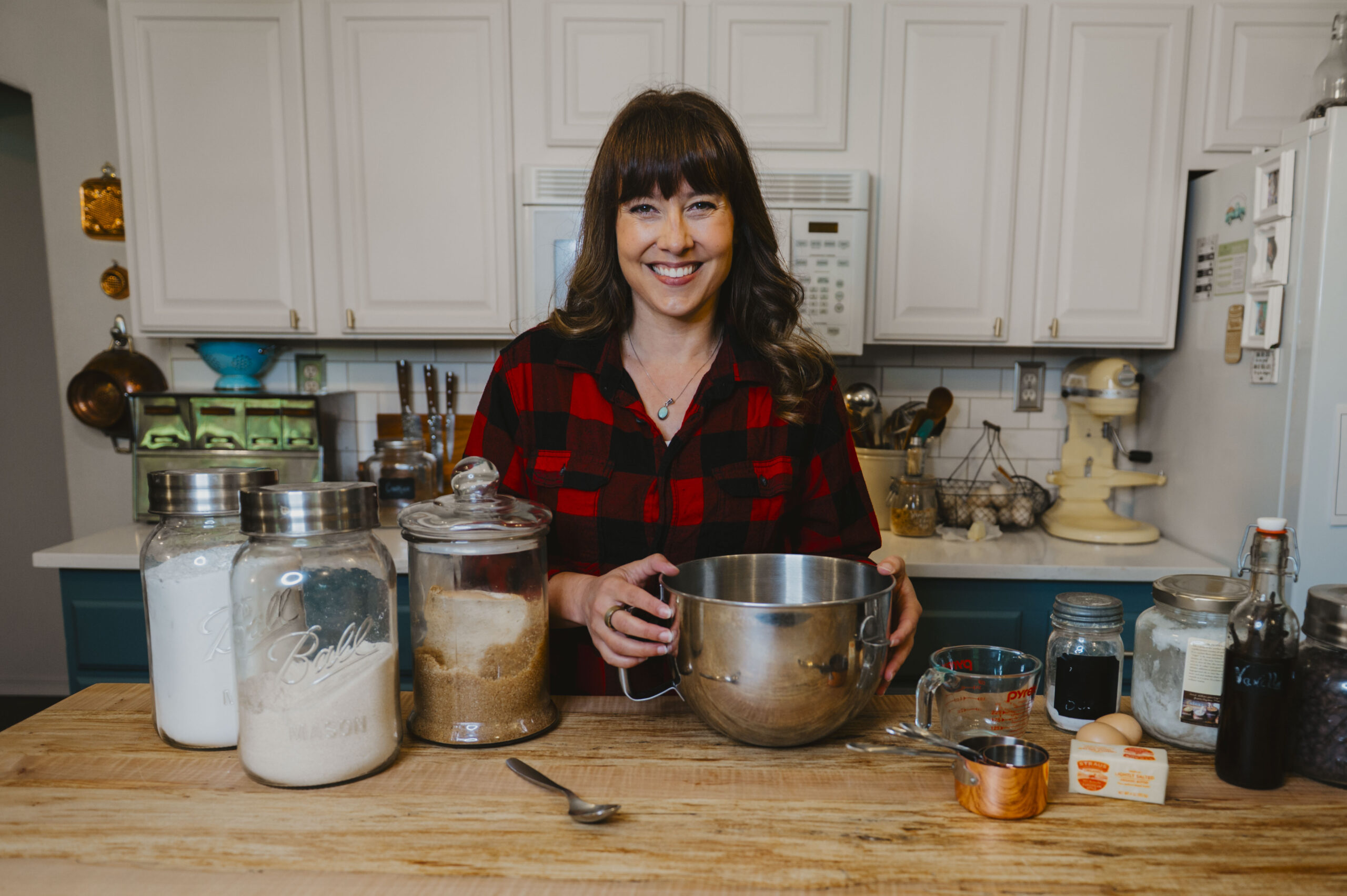 A woman cooking in the kitchen.