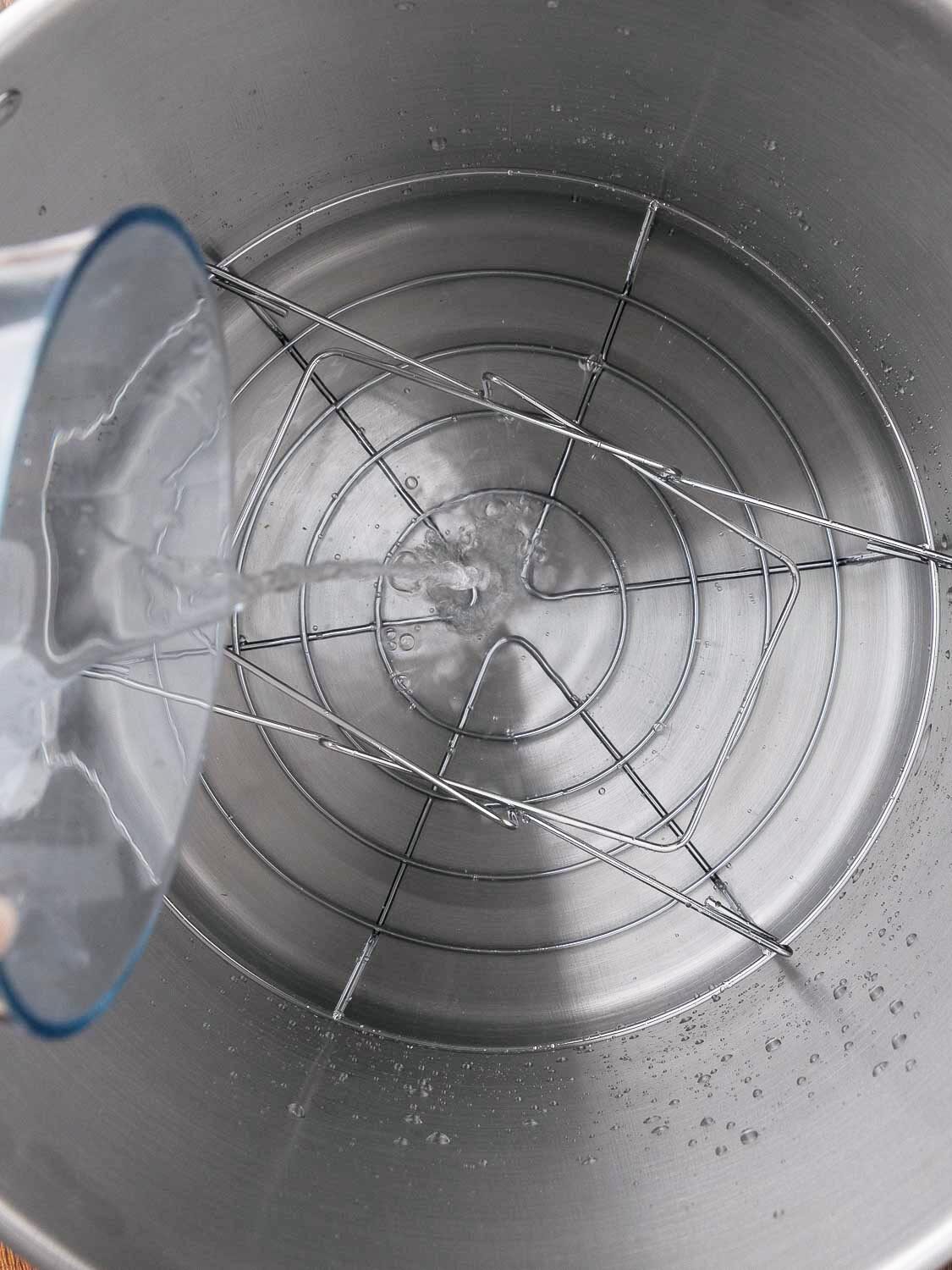 Water being added to a large pot.