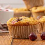 Finished cranberry muffins stacked high.