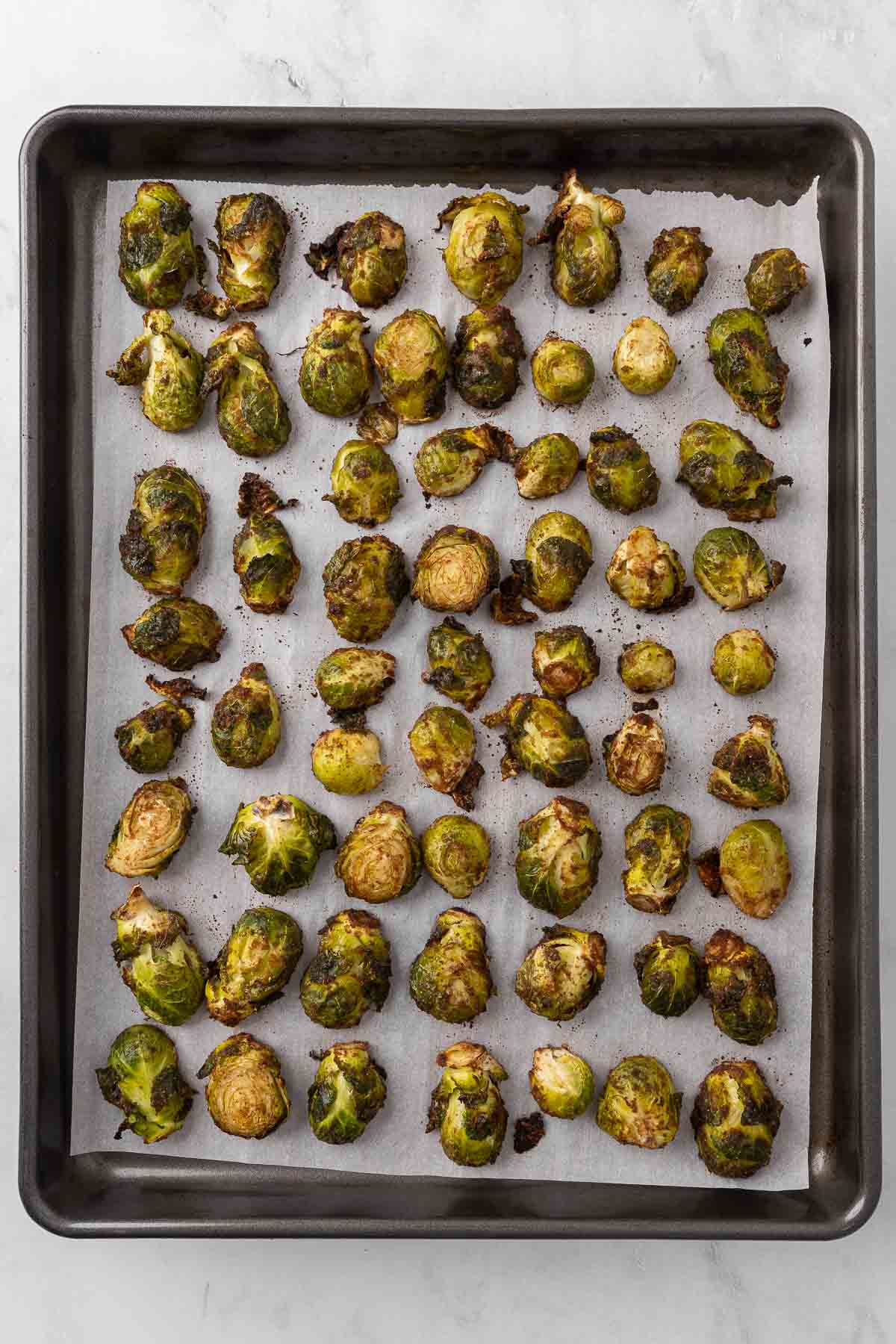 Honey Balsamic Brussel Sprouts on a baking sheet.