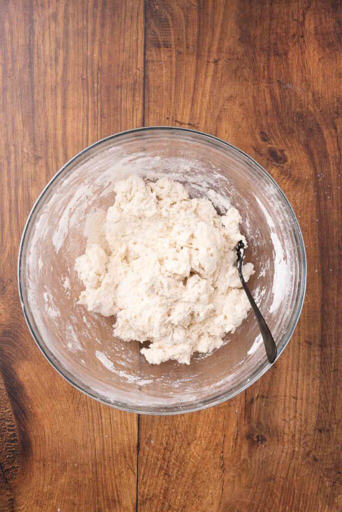 Bannock dough in a glass bowl.