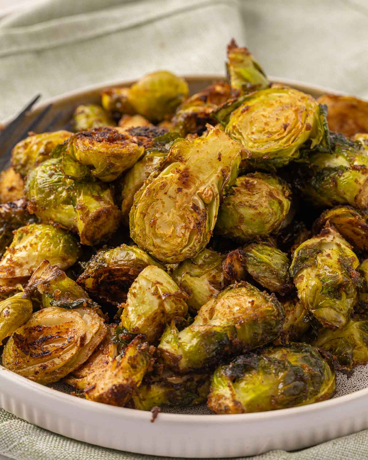 Honey Balsamic Brussel Sprouts on a white plate.