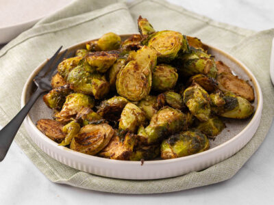 Honey Balsamic Brussel Sprouts on a white plate.