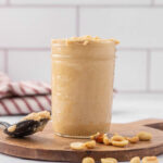 A pint jar full of homemade peanut butter.