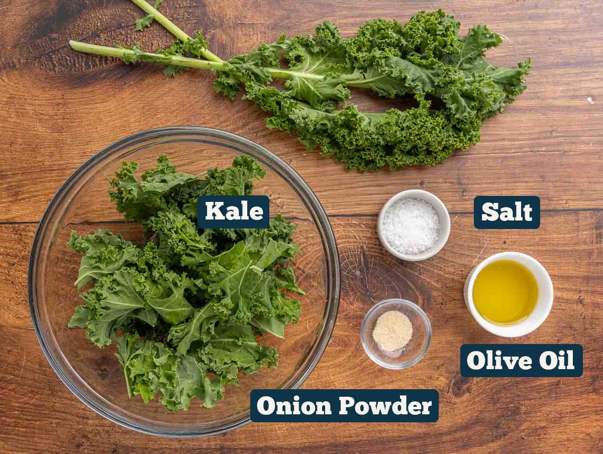 Baked kale chip ingredients: kale, salt, olive oil, and onion powder.