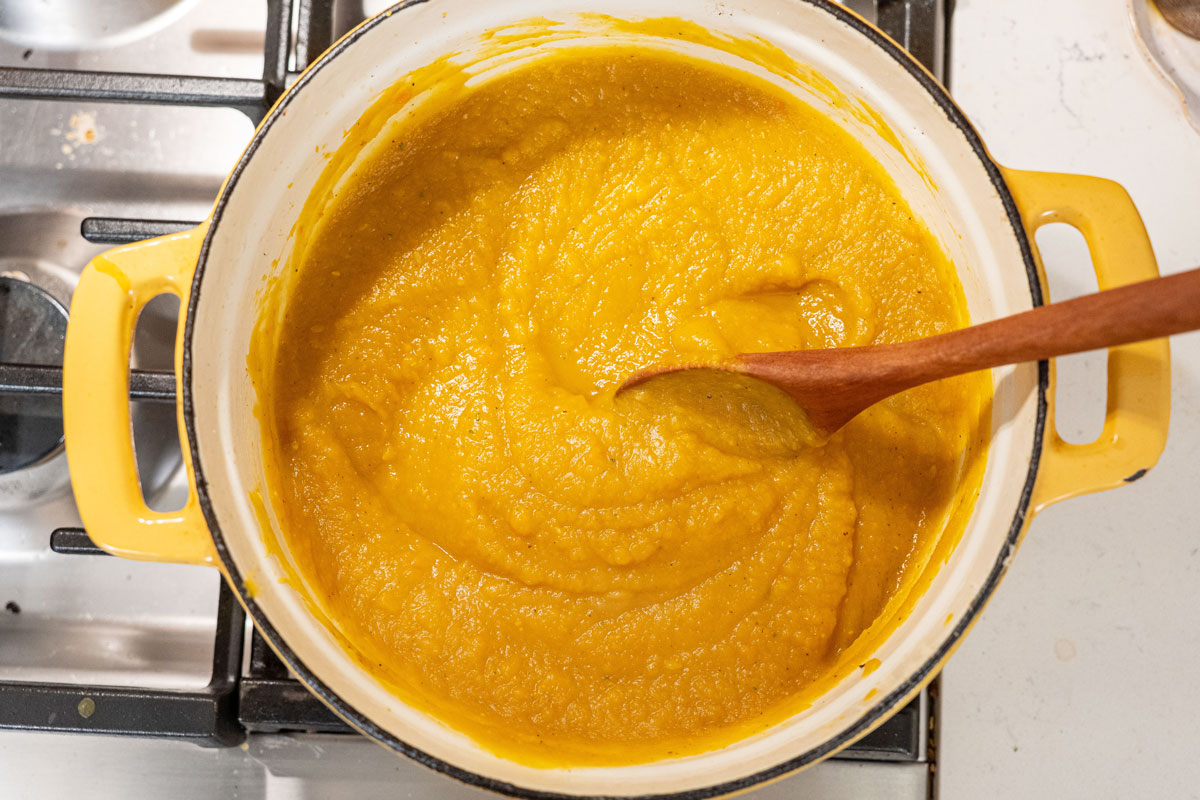 Creamy Delicata squash soup in a Dutch oven.