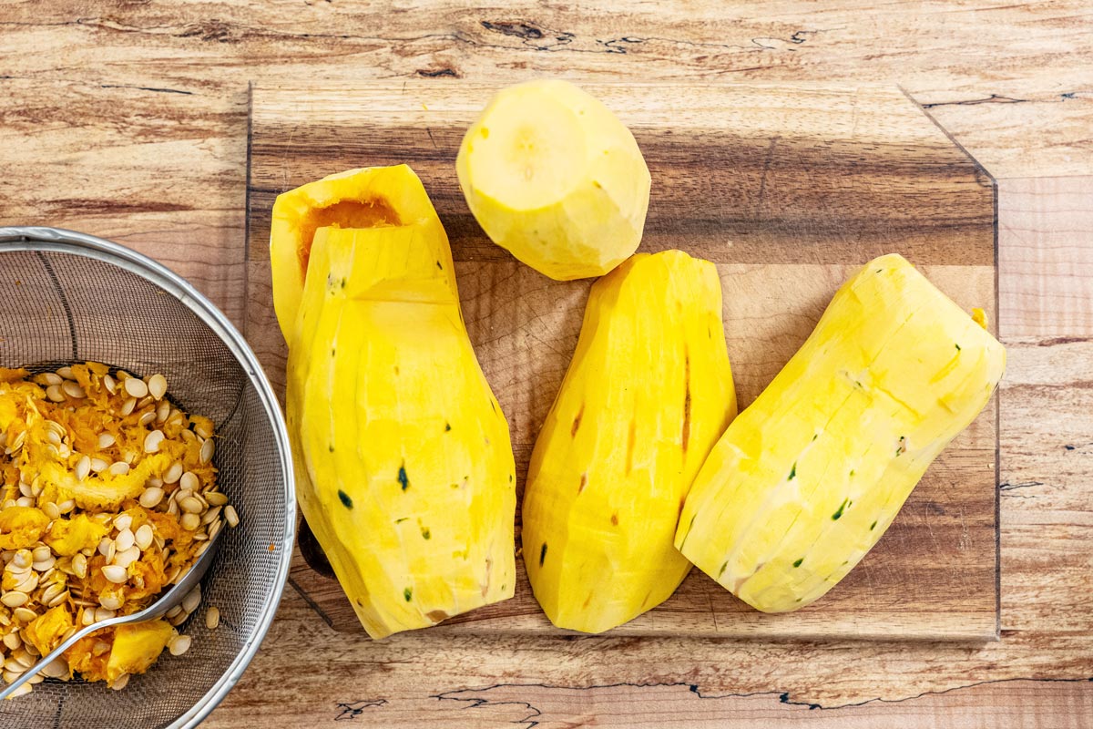 Delilcata squash peeled, halved and deseeded.