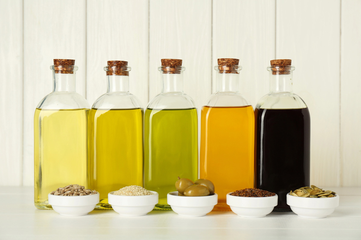 Cooking oils in glass bottles.