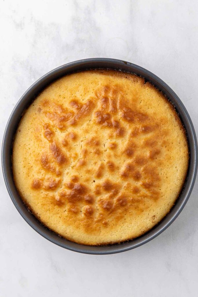 Bird's eye view of a pineapple upside down cake prior to turning it over.
