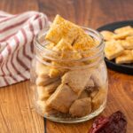 A glass jar full of Mexican crackers.