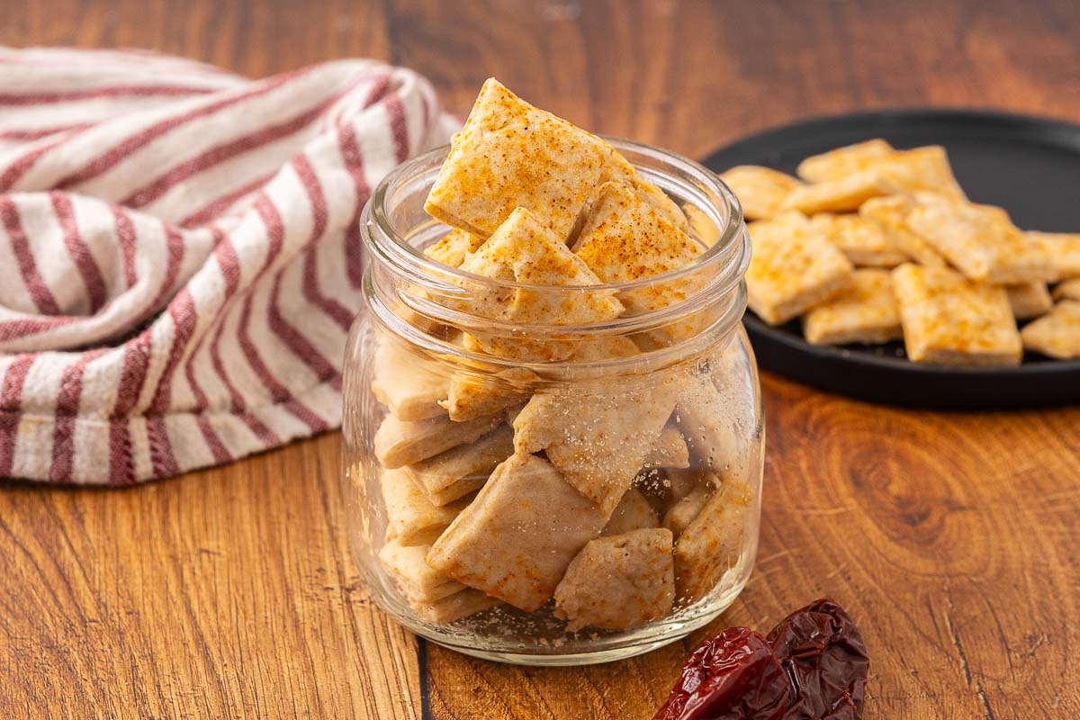 A glass jar full of Mexican crackers.