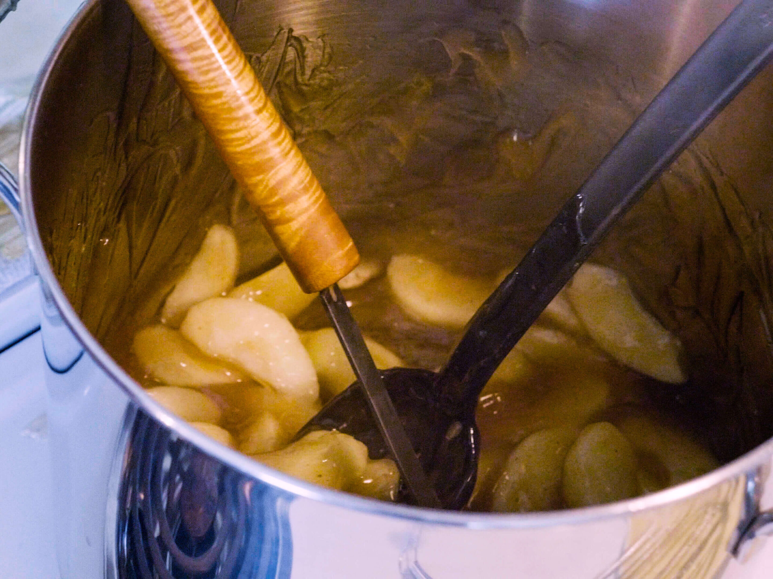 Apple pie filling in a large pot.