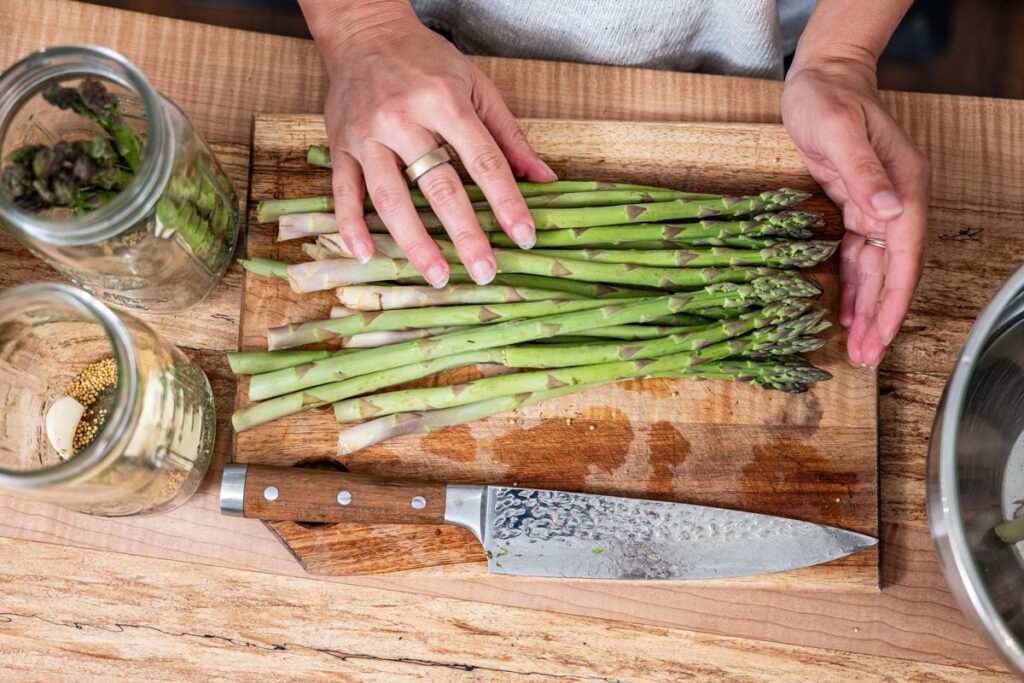 Asparagus on a cutting board.