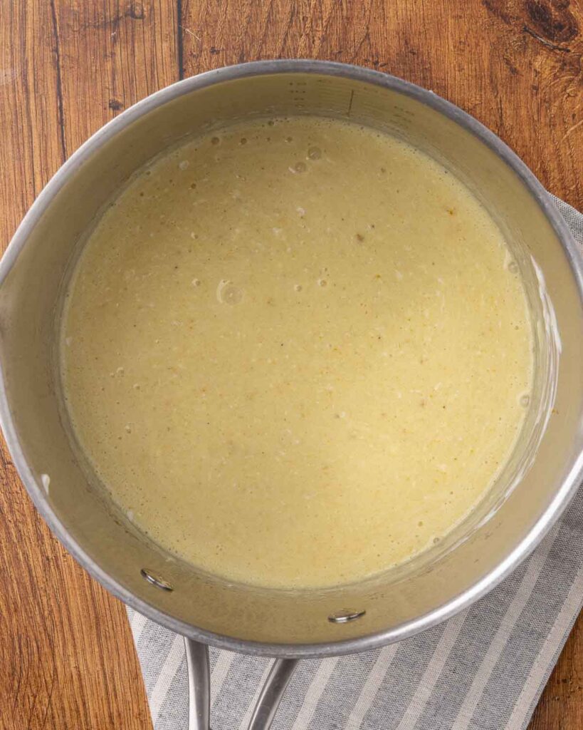 A roux mixed together with mayonnaise and curry powder to make a sauce for chicken and broccoli casserole.